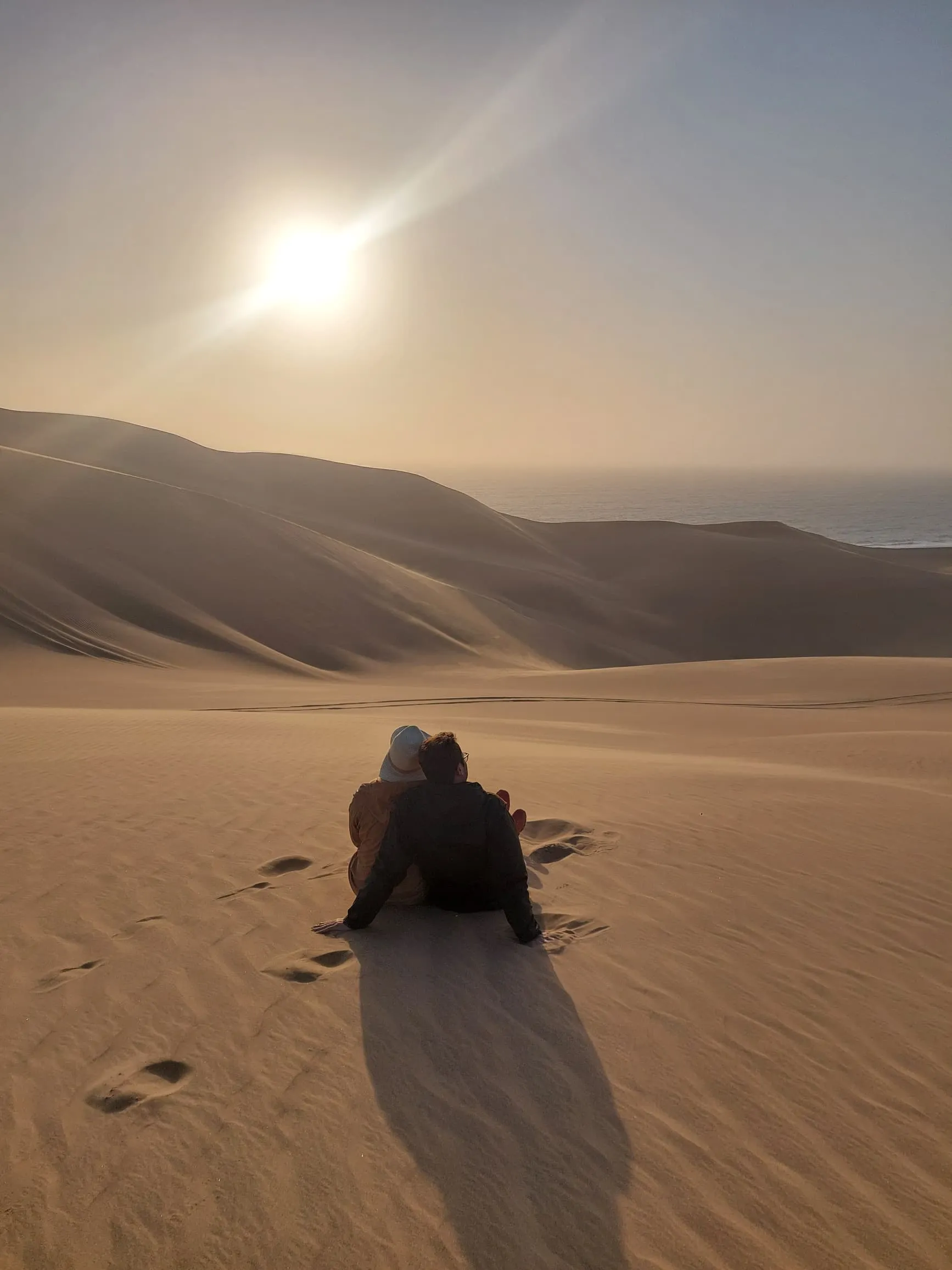 Breathtaking coastal dunes and ocean waves at Sandwich Harbour, Namibia's Ramsar site