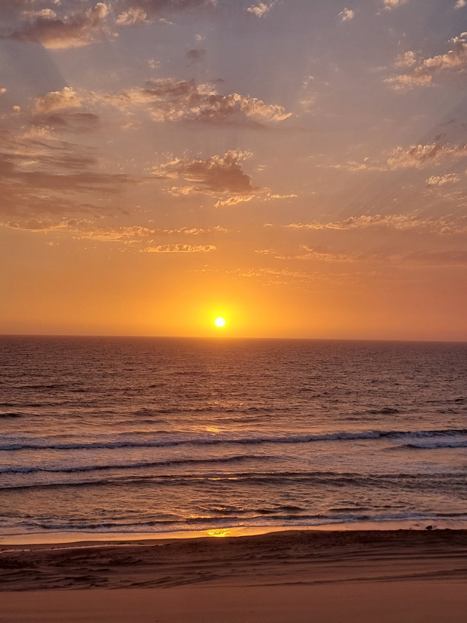 Dramatic contrast of desert and ocean at Sandwich Harbour, Namibia