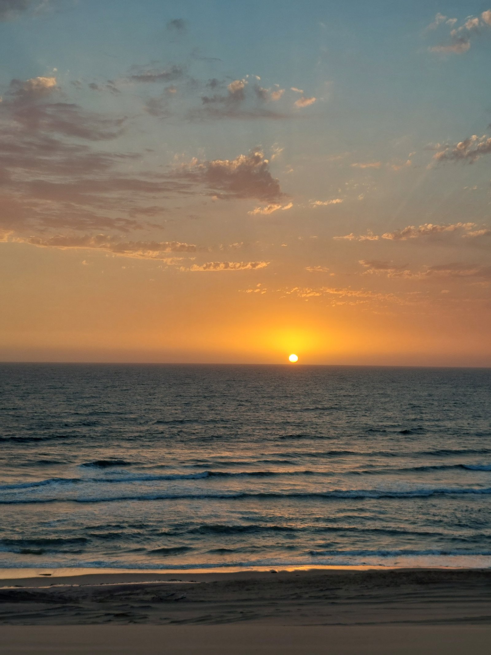 Sandwich Harbour's vast sand sea meeting the Atlantic waves